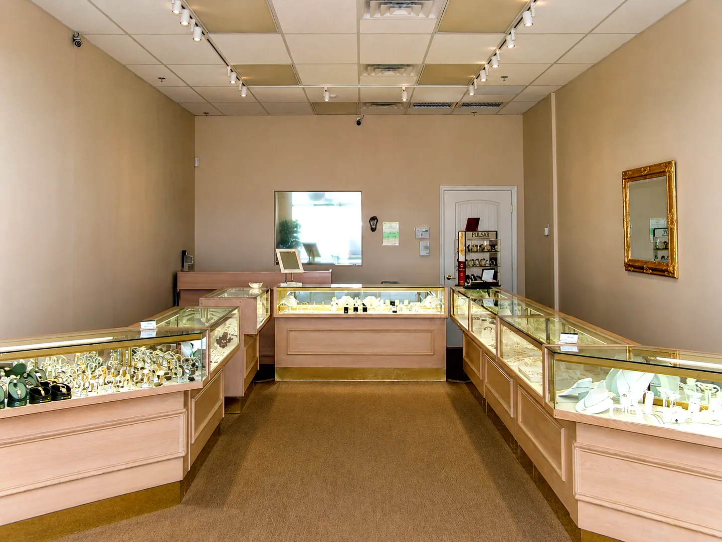 Inside the original V Jewelers store in 2005, display cases filled with jewelry
