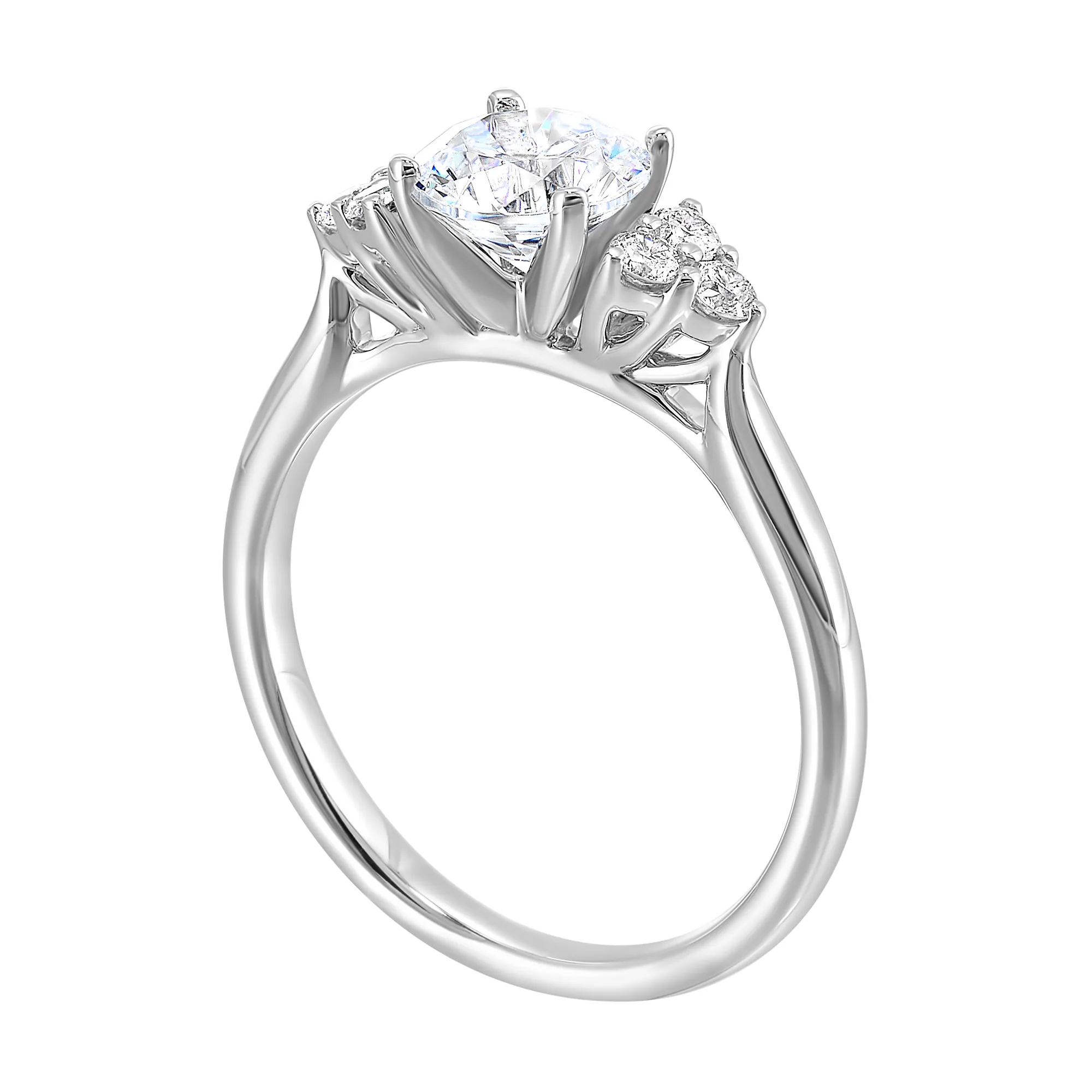 Three stone ring features a trinity of diamonds on either side, focusing the round solitaire at center, is a symbol of everlasting love. view 4